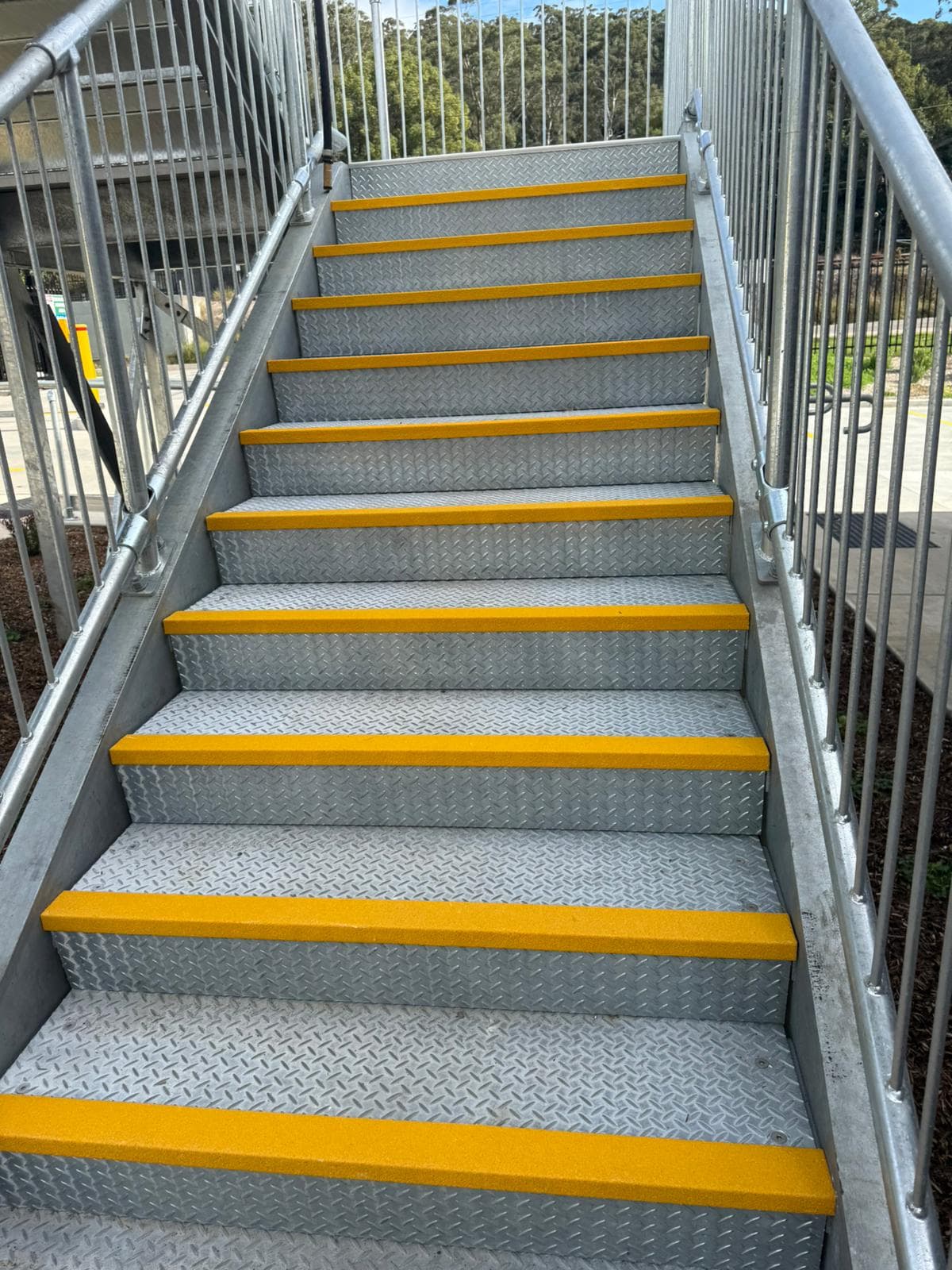 Galvanised stair with chequer plate treads and yellow anti-slip nosings, Ourimbah