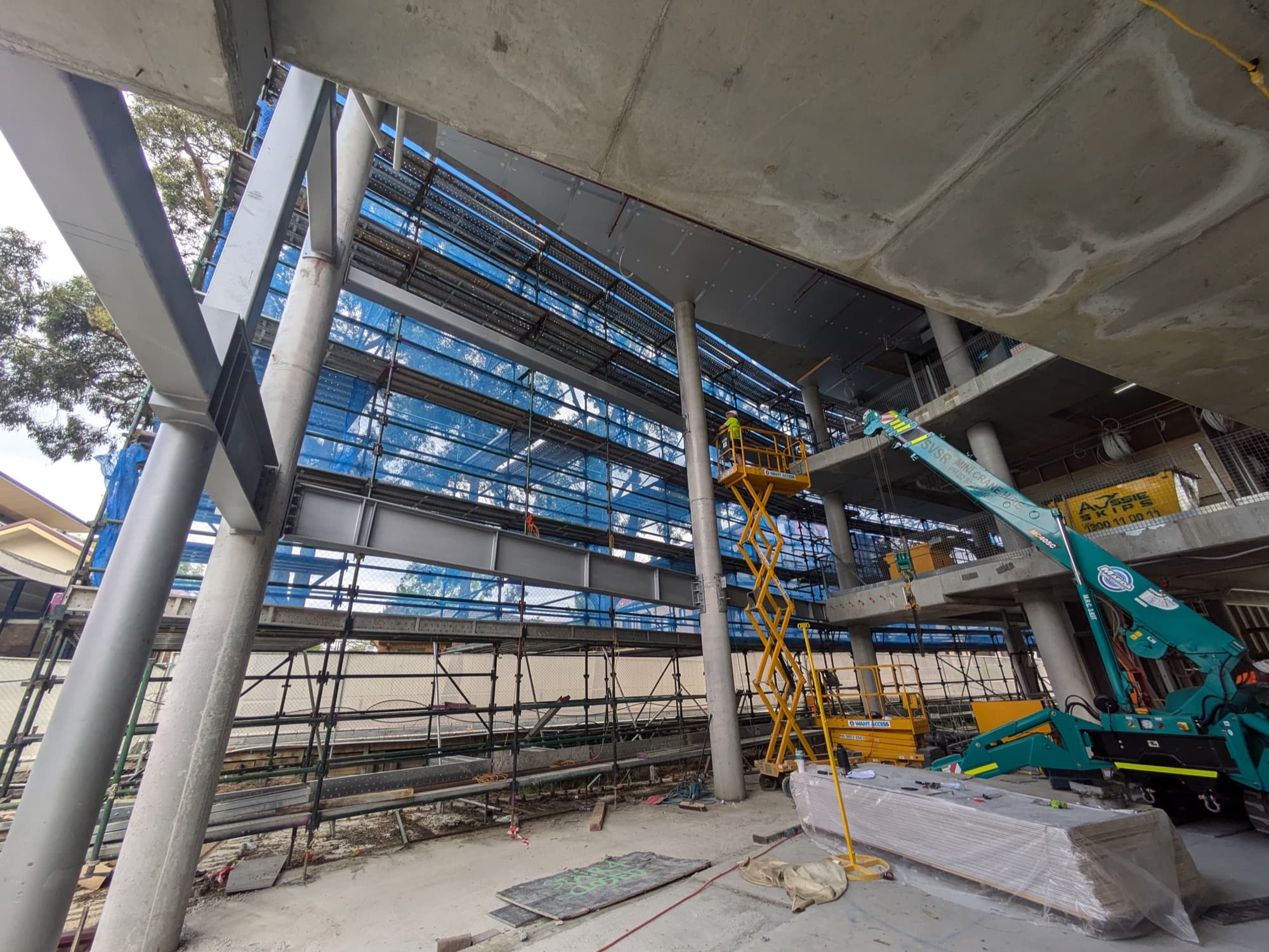Steel frame and scaffold on a school building site, Strathfield